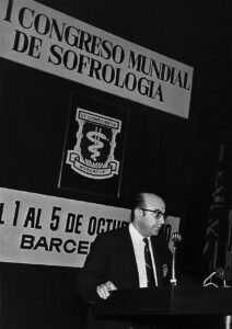 man speaking on stage